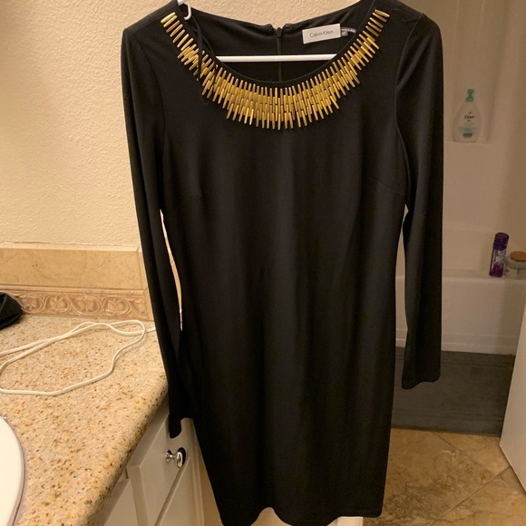 Calvin Klein Dresses & Skirts - Calvin Klein Black Dress with gold detail Calvin Klein Dresses & Skirts - Calvin Klein Black Dress with gold detail